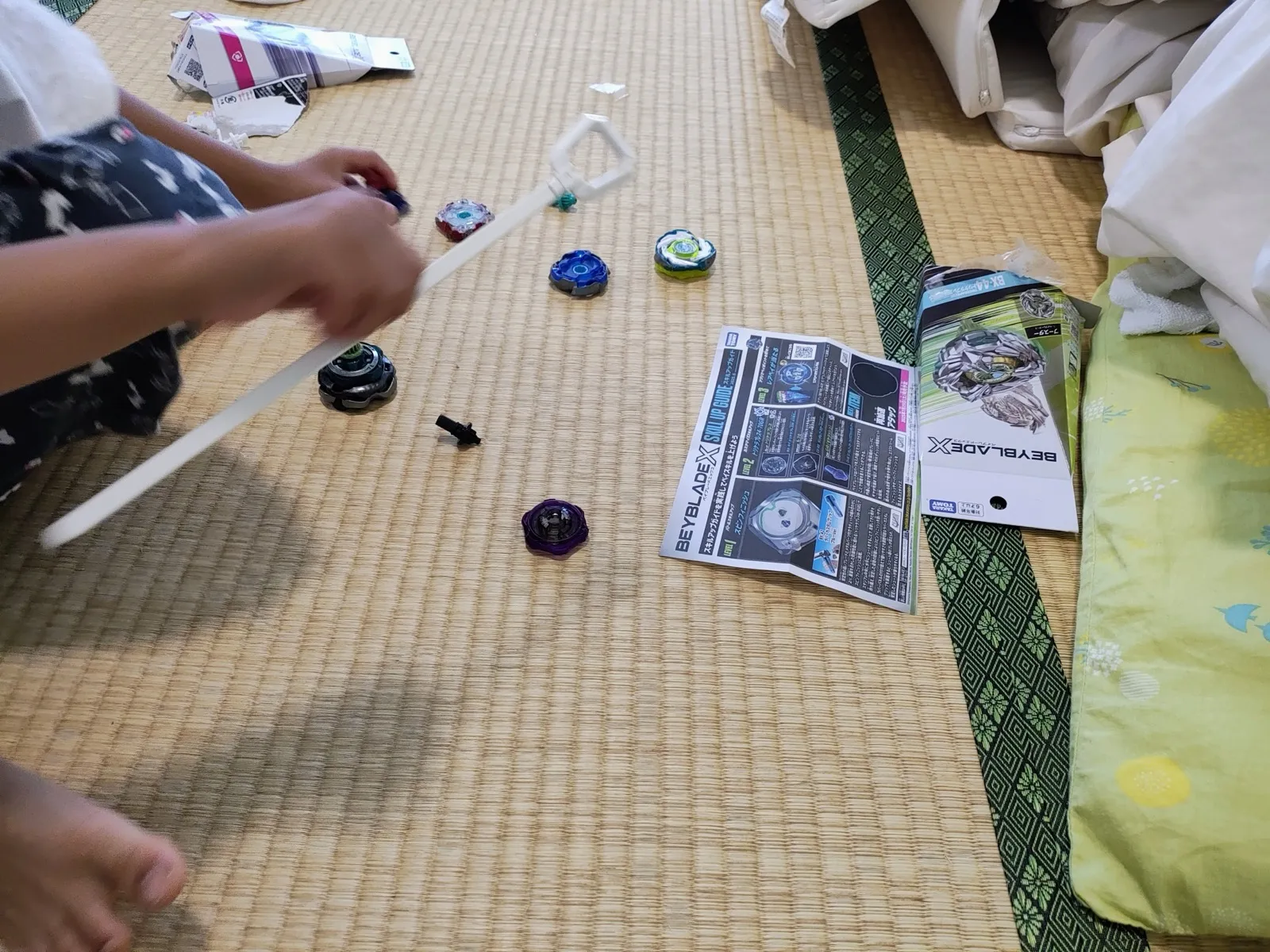 ワインダーランチャーの板を引く手元